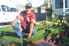 El Cajon sprinkler repair contractor checks a sprinkler head